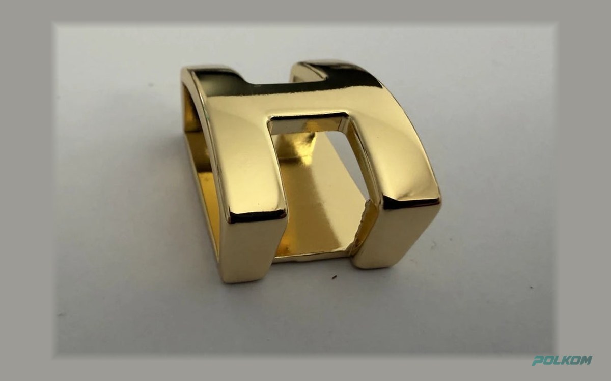 Premium metalldetalj – bältesslinga 25 mm i guld, dekorativ öppen form