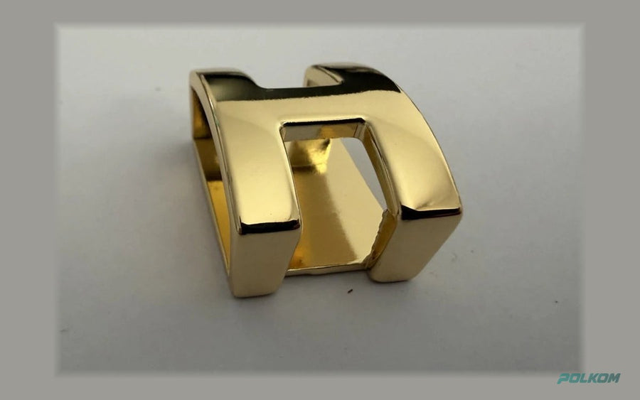 Premium metalldetalj – bältesslinga 25 mm i guld, dekorativ öppen form