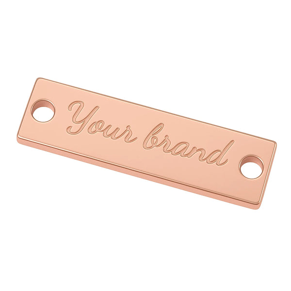 Plaque métallique avec logo gravé – couleur nickel (nickel free)