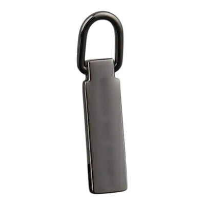 Lynlåstrækker i metal med logo i gunmetal og ring til skyderen