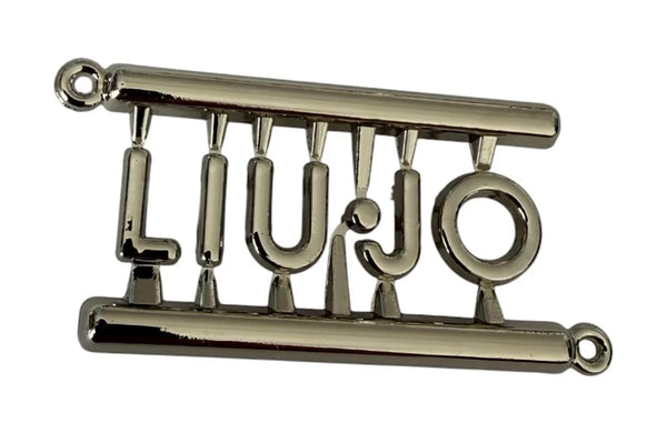 Plaque métallique à monogramme pour maillots et ceintures – vue de côté des fentes de 20 mm