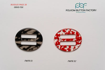 Oval polyester buckles in smoky black and with red chips