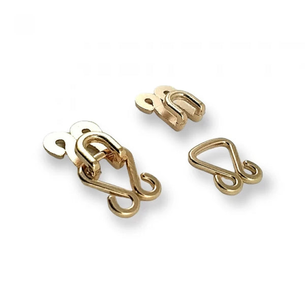 Påsydd hyska och hake – guld, två storlekar