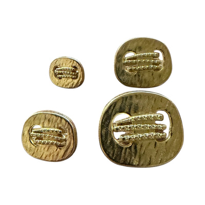 Gold oval metal knot buttons in four sizes for coats and jackets