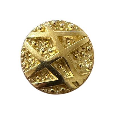 Gold metal button with a geometric relief of crossing lines and dots for jackets